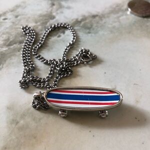 Vintage Avon skateboard‎ necklace.